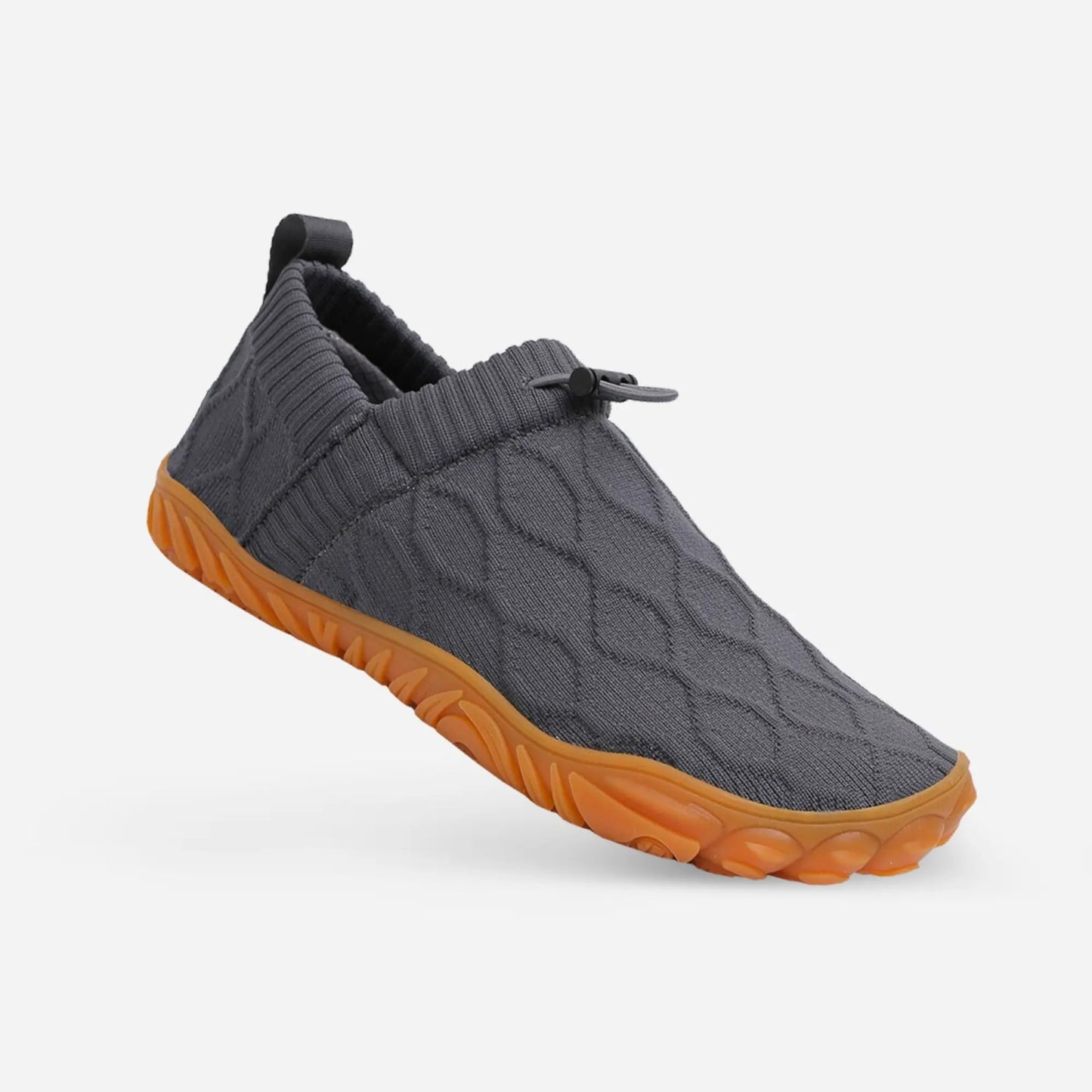 Barefoot beach shoes on sand